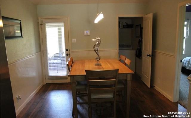 dining area featuring dark hardwood / wood-style floors