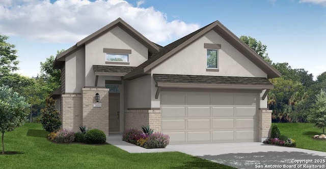 view of front facade with a garage and a front lawn