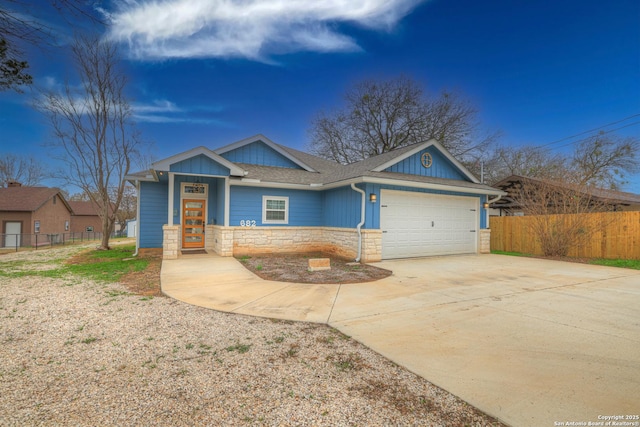 craftsman-style home with a garage