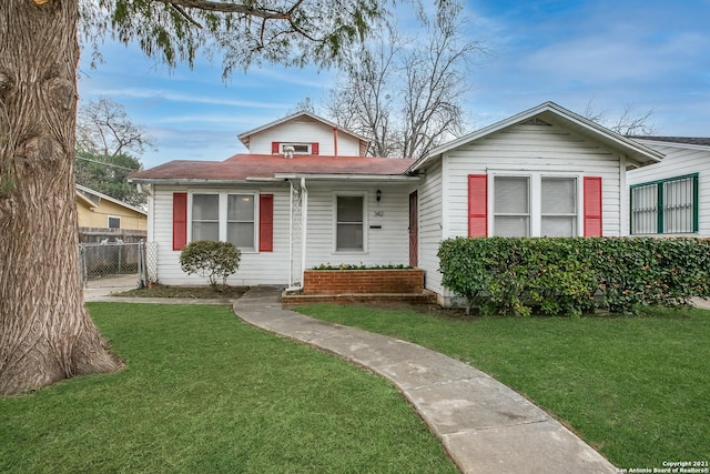 view of front of home with a front yard