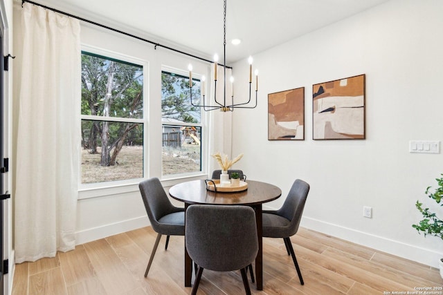 dining room with hardwood / wood-style flooring