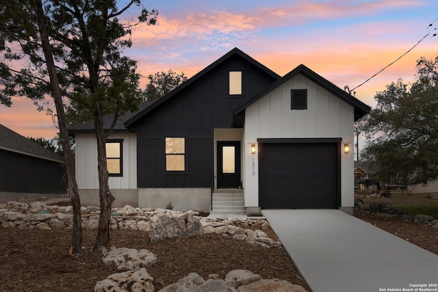 modern inspired farmhouse featuring a garage