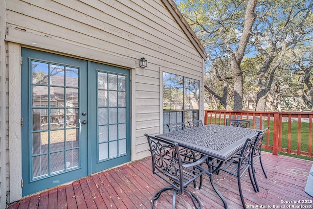 wooden terrace featuring french doors