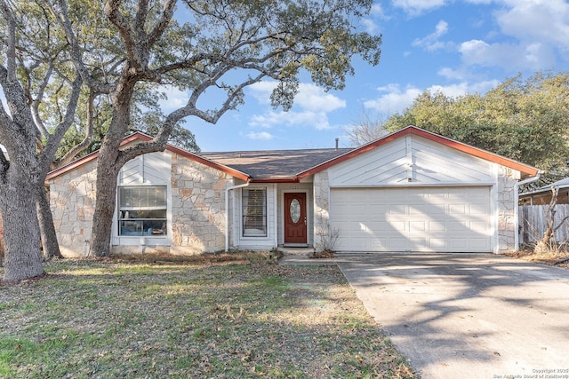 ranch-style home with a garage