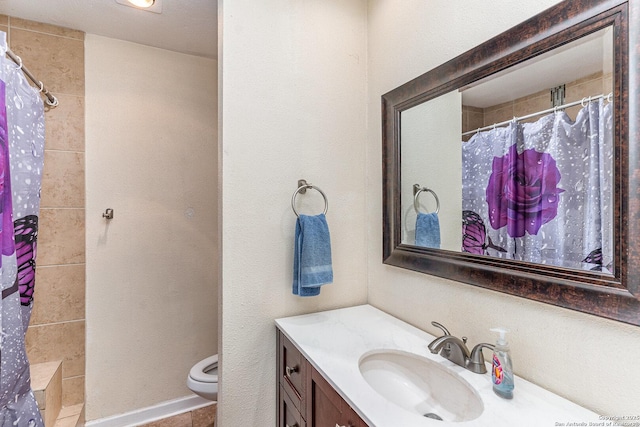 bathroom featuring vanity, a shower with curtain, and toilet