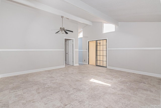 unfurnished room featuring ceiling fan and vaulted ceiling with beams