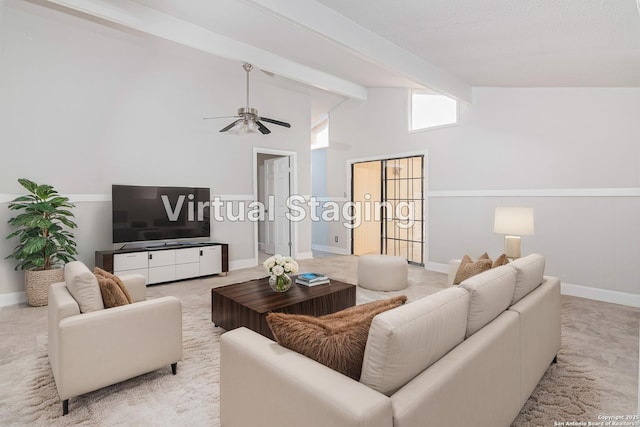 living room featuring vaulted ceiling with beams and ceiling fan