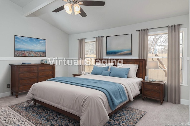 bedroom with multiple windows, vaulted ceiling, and carpet flooring