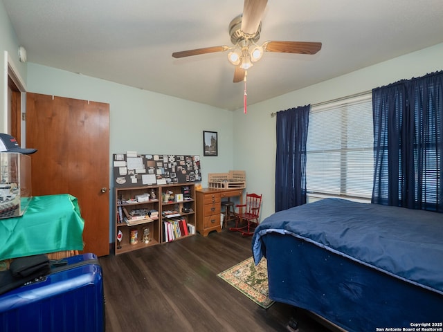 bedroom featuring wood-type flooring and ceiling fan