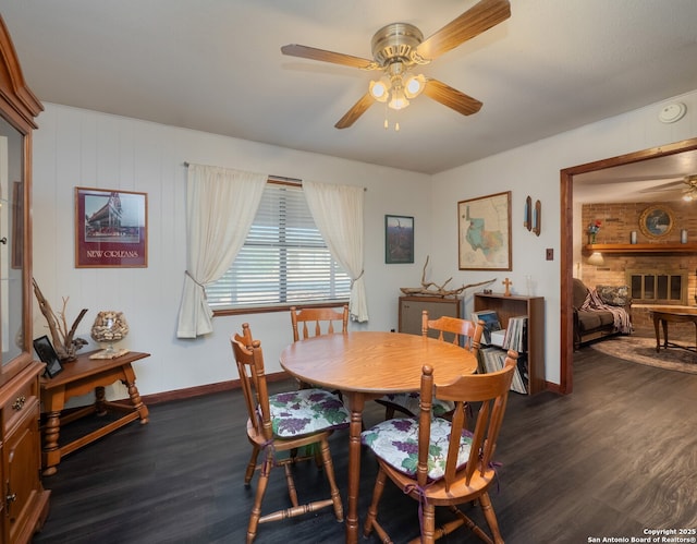 dining room featuring dark hardwood / wood-style flooring and ceiling fan