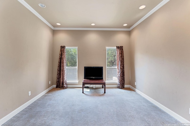 interior space featuring crown molding and light carpet