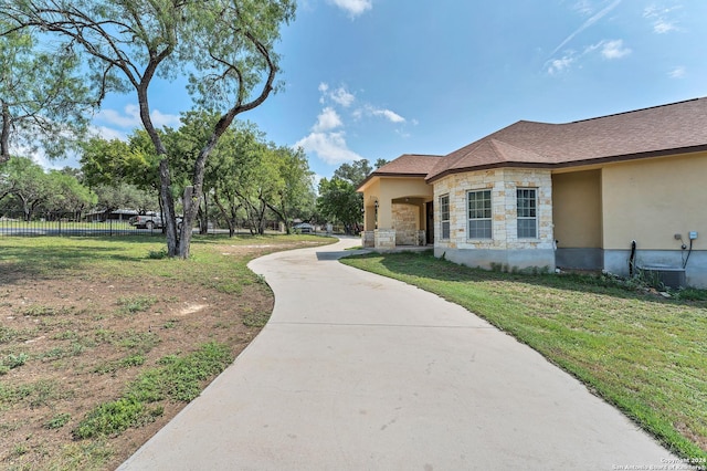 exterior space featuring a lawn