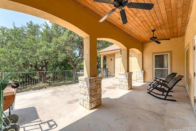 view of patio featuring ceiling fan