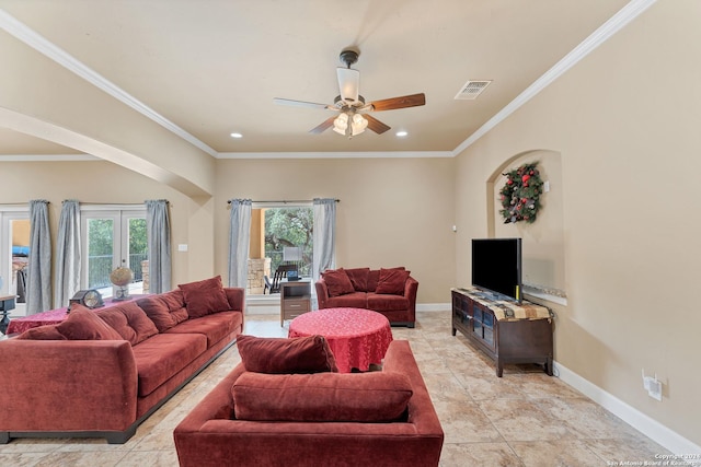 living room with ornamental molding, ceiling fan, and light tile patterned flooring