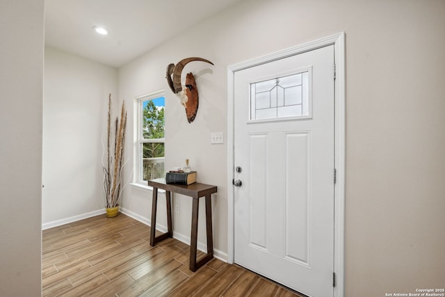 entryway with light hardwood / wood-style flooring