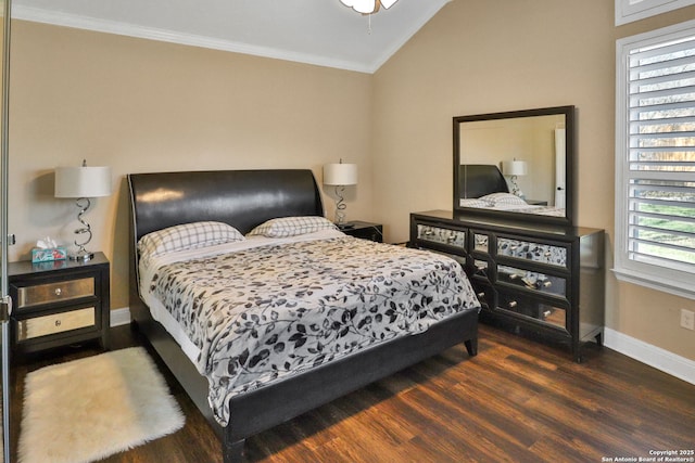 bedroom featuring lofted ceiling, crown molding, and dark wood-type flooring