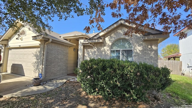 single story home with a garage