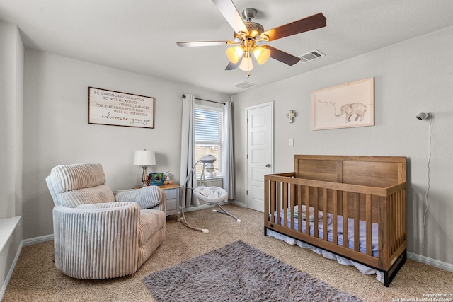 carpeted bedroom featuring ceiling fan