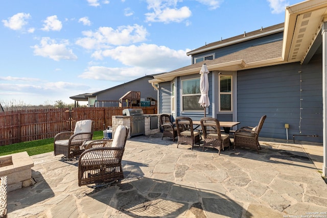 view of patio / terrace featuring an outdoor kitchen and grilling area