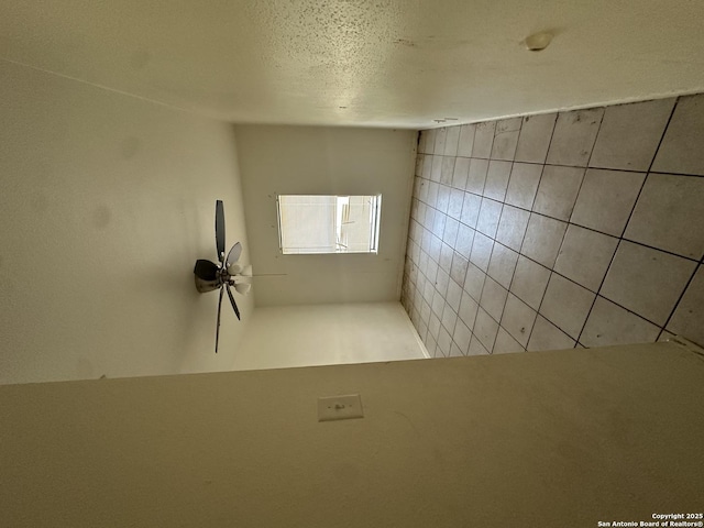 empty room with a textured ceiling