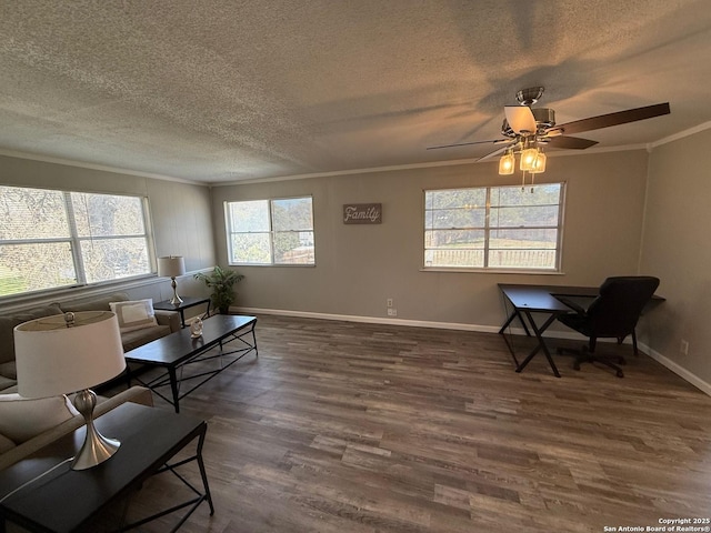 living room featuring ceiling fan, crown molding, dark wood-type flooring, and a textured ceiling