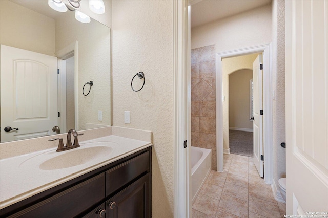 bathroom featuring tile patterned floors and vanity