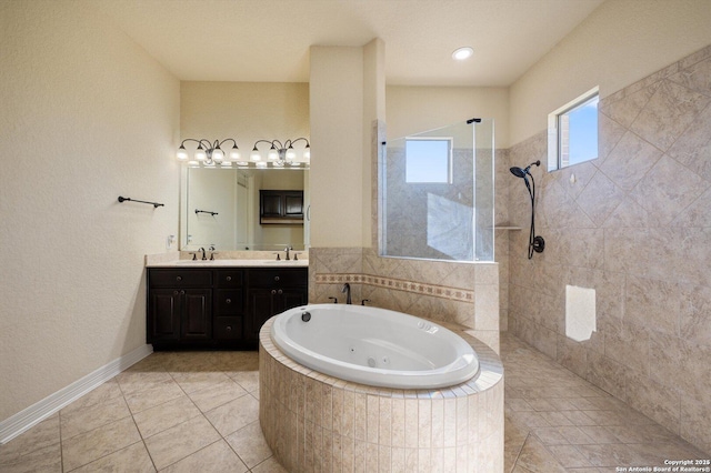 bathroom featuring separate shower and tub and vanity