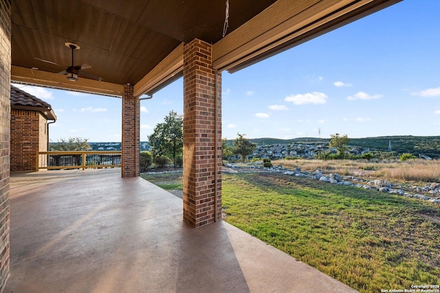 view of patio / terrace featuring ceiling fan