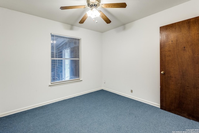 unfurnished room with ceiling fan and carpet flooring