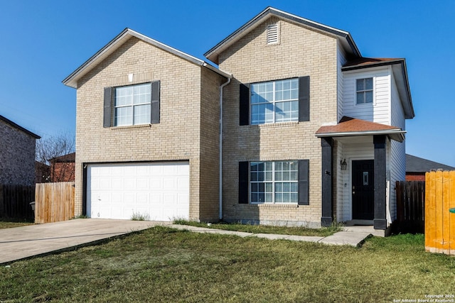 view of front property with a garage and a front yard