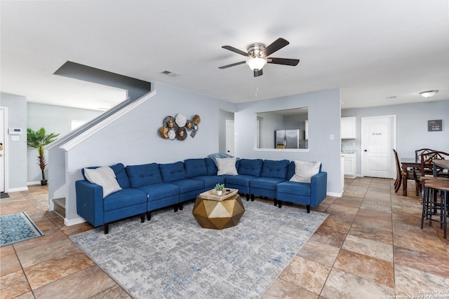 living room featuring ceiling fan