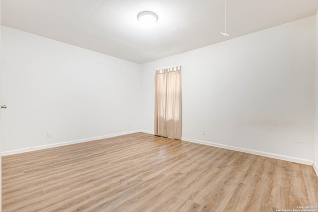 empty room featuring light hardwood / wood-style floors