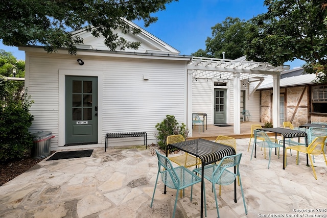 view of patio with a pergola and a deck