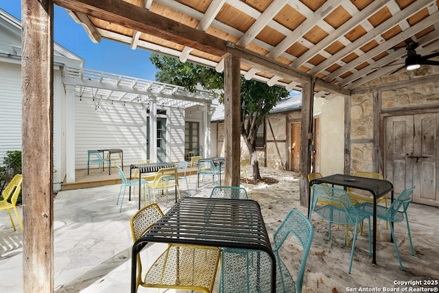 view of patio / terrace with a pergola and ceiling fan