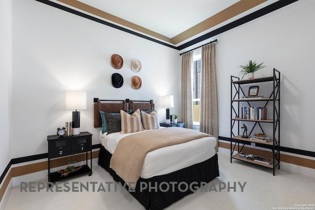 bedroom featuring light carpet