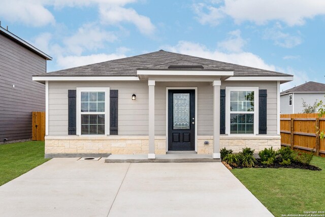11506 Bald Eagle Hts, San Antonio, TX 78223 - view of front of house with a front lawn