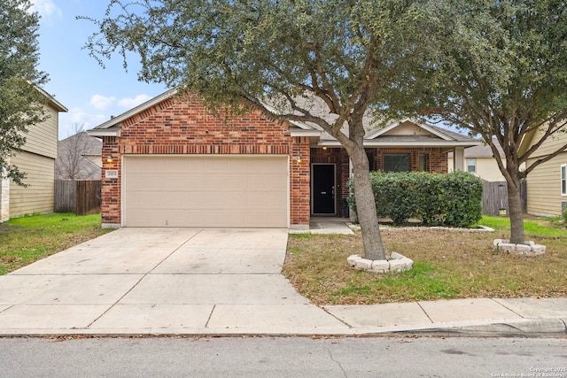 view of front of property featuring a garage and a front lawn