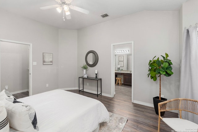 bedroom with dark hardwood / wood-style flooring, connected bathroom, and ceiling fan