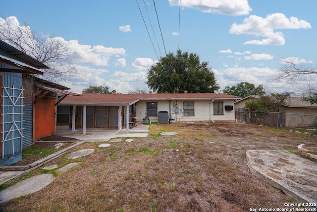 rear view of house featuring a patio area