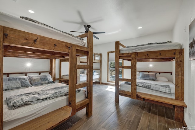 bedroom featuring dark hardwood / wood-style flooring