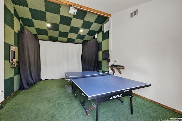 rec room featuring lofted ceiling and carpet floors