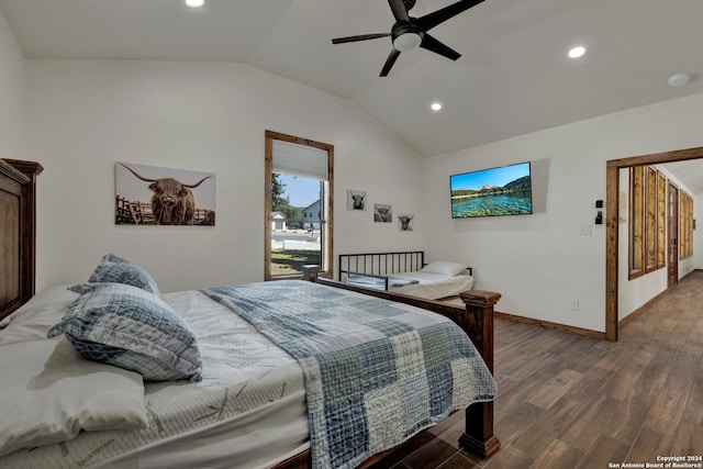 bedroom with ceiling fan, lofted ceiling, and dark hardwood / wood-style floors