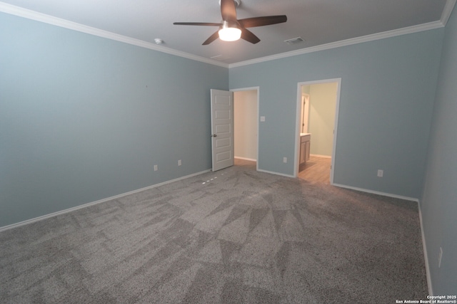 unfurnished bedroom with crown molding, carpet floors, and ceiling fan