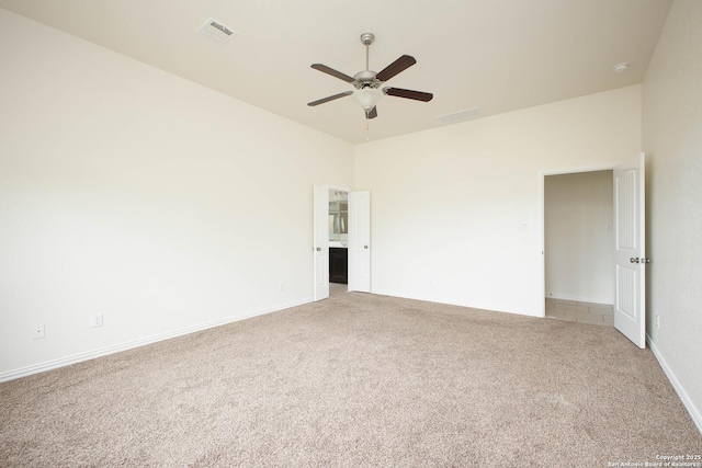 carpeted empty room with ceiling fan