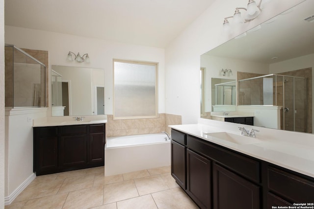 bathroom featuring vanity, independent shower and bath, and tile patterned flooring