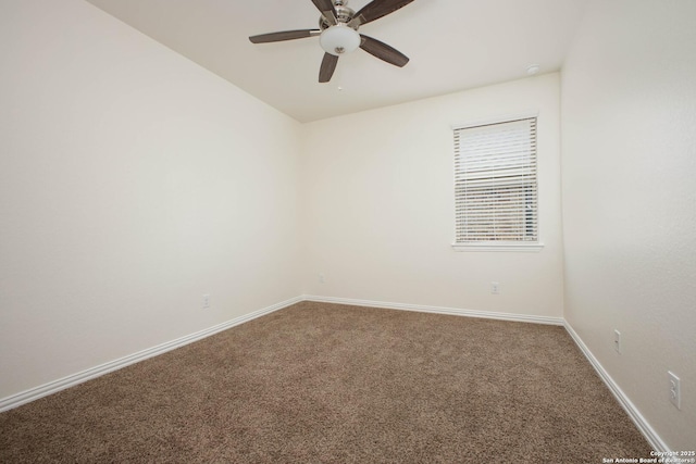 empty room featuring carpet floors and ceiling fan