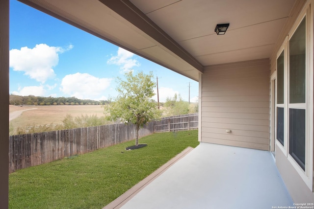 view of patio / terrace featuring a rural view