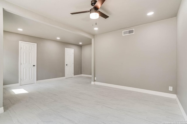 unfurnished room featuring ceiling fan