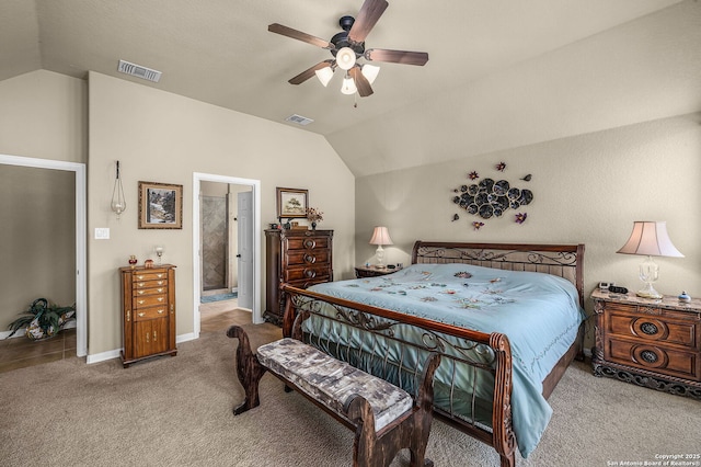 bedroom with vaulted ceiling, light carpet, and ceiling fan