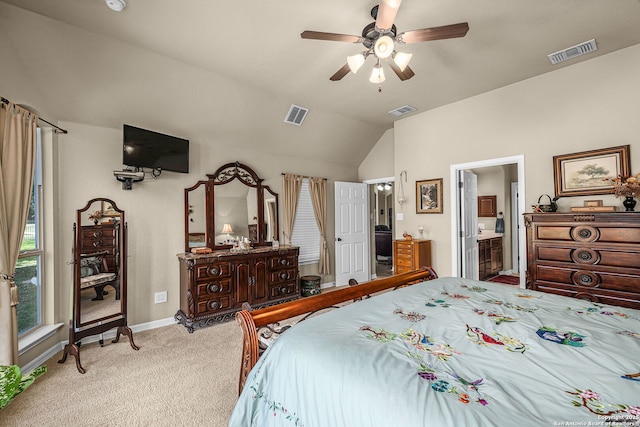 bedroom with ceiling fan, lofted ceiling, and light carpet